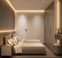 Schlafzimmer im Ferienapartment mit Doppelbett, Einbauschränken und sanfter Beleuchtung.