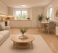 In der 4-Zimmer-Wohnung gibt es eine offene Küche mit einem Essbereich und einem Boden in Holzoptik.