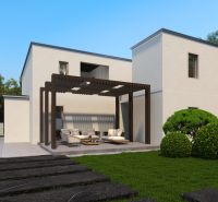 Ein Einfamilienhaus in Holice mit Garten und Pergola auf der Terrasse.