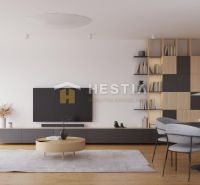 Wohnzimmer in einem Einfamilienhaus mit Holzboden, Fernseher und Esstisch.