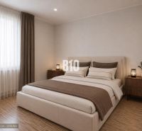 Schlafzimmer in einer 3-Zimmer-Wohnung mit hellen Wänden und einem Boden in Holzoptik.