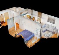 3D-Modell einer 2-Zimmer-Wohnung mit Holzboden und offenem Wohnbereich.