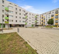 In Bratislava - Dúbravka on Pri Hrubej lúke street, apartment buildings and a playground.