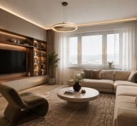 Wohnzimmer in einer 2-Zimmer-Wohnung mit Sofa, Tisch und Holzboden.