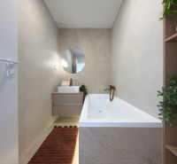 Badezimmer mit Badewanne und Waschbecken in einer 3-Zimmer-Wohnung mit beigen Wänden.