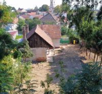 Ein Einfamilienhaus am St.-Florians-Platz in Krakovany mit umliegendem Grün.