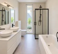 Badezimmer mit zwei Waschbecken, einer Dusche und einer Badewanne in einem Einfamilienhaus.