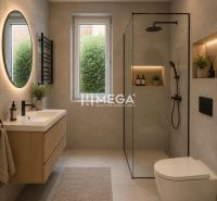 Badezimmer in einem Einfamilienhaus mit Waschbecken, Duschkabine und dekorativer Beleuchtung.
