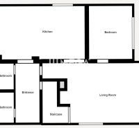 Der Grundriss des Einfamilienhauses umfasst eine Küche, ein Wohnzimmer, ein Schlafzimmer und zwei Badezimmer.