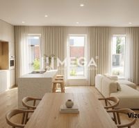 Küche und Wohnzimmer in einem Einfamilienhaus mit Holzboden und großen Fenstern.