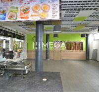Interieur von Geschäftsräumen mit Essbereich, Angebot an der Wand.