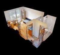 3D-Ansicht eines Studio-Apartments mit Holzboden und Einrichtung.