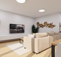 Wohnzimmer mit bequemer Couch, Couchtisch und Fernseher, Boden mit Holzdekor.