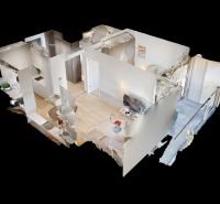 3D-Grundriss einer 2-Zimmer-Wohnung mit Holzboden und Möbeln.