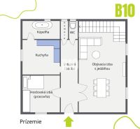 Grundriss des Erdgeschosses eines Einfamilienhauses: Wohnzimmer mit Essbereich, Küche, Badezimmer, Zimmer.