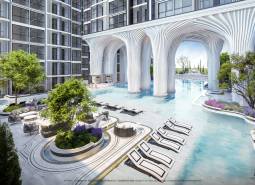 Wohnungsbau in Pattaya: Pool, Liegestühle, Grünflächen, moderne Architektur, Außenbereich, sonniger Ort.