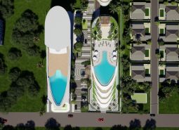 Luftaufnahme des Wohnungsbaus in Phuket mit Pool und Villen.