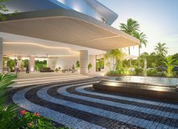 Architektonischer Eingang mit Garten und Brunnen. Der Wohnungsbau in Phuket bietet eine luxuriöse Umgebung.