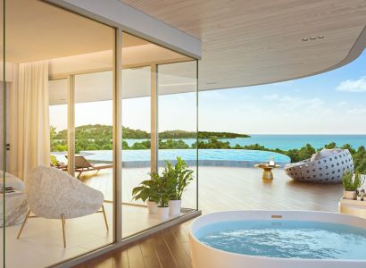 Elegantes Interieur mit Blick auf die Terrasse, den Pool und den Ozean, Wohnungsbau.