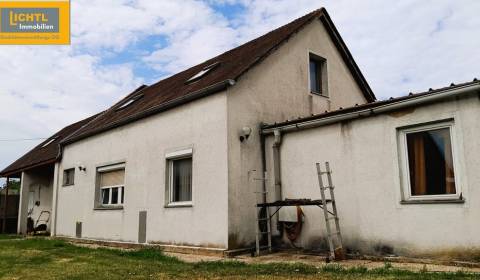 Erweitertes Einfamilienhaus mit Dachausbau zum Finalisiere