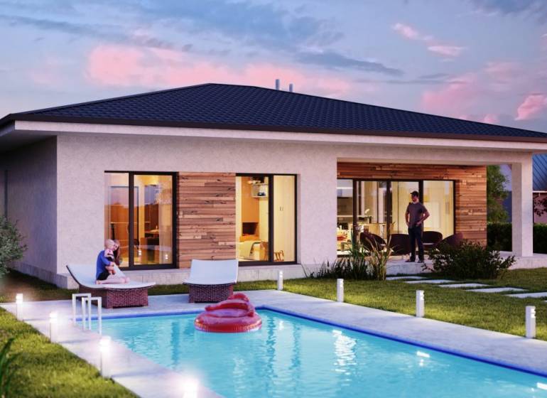 Ein Ferienhaus in Pezinok auf der Bratislavská Straße mit Pool und Terrasse in abendlicher Beleuchtung.