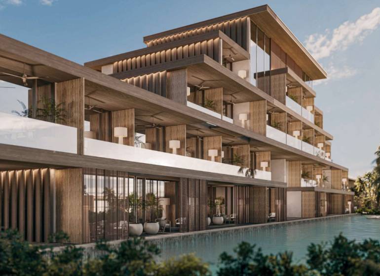 Ein Einfamilienhaus in Nungwi, Sansibar Nord mit Terrassen und einem Pool in der Nähe eines modernen Resorts.