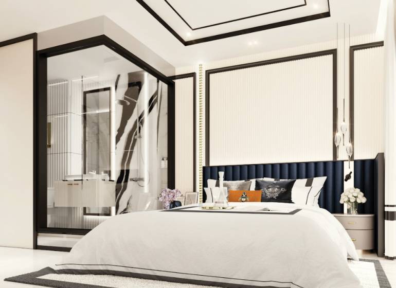 Schlafzimmer in einer 3-Zimmer-Wohnung mit großem Bett und verglastem Badezimmer.