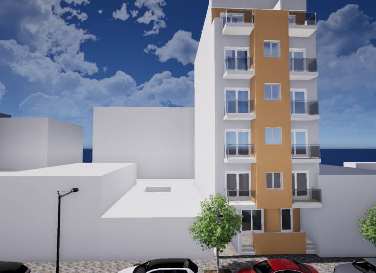 Ein Gebäude in Torrevieja in der Straße Campoamor 12, daneben sind Autos geparkt.