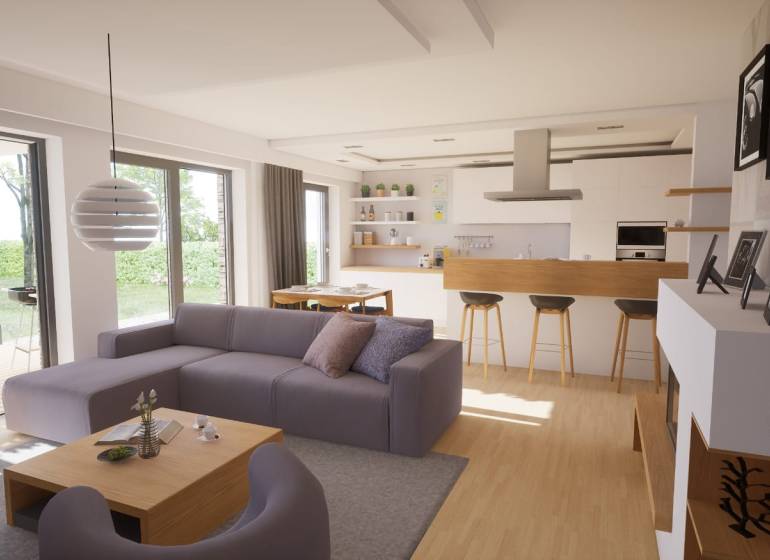 Wohnzimmer mit Holzboden und Kücheninsel in einem Einfamilienhaus.