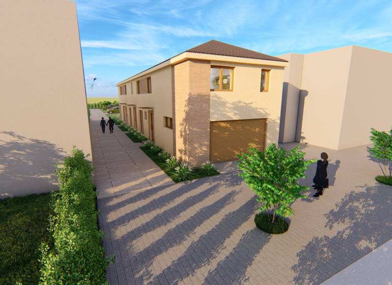 Ein zweistöckiges Gebäude mit einer Straße in der Litoměřická-Straße in Topoľčianky, umgeben von Bäumen.