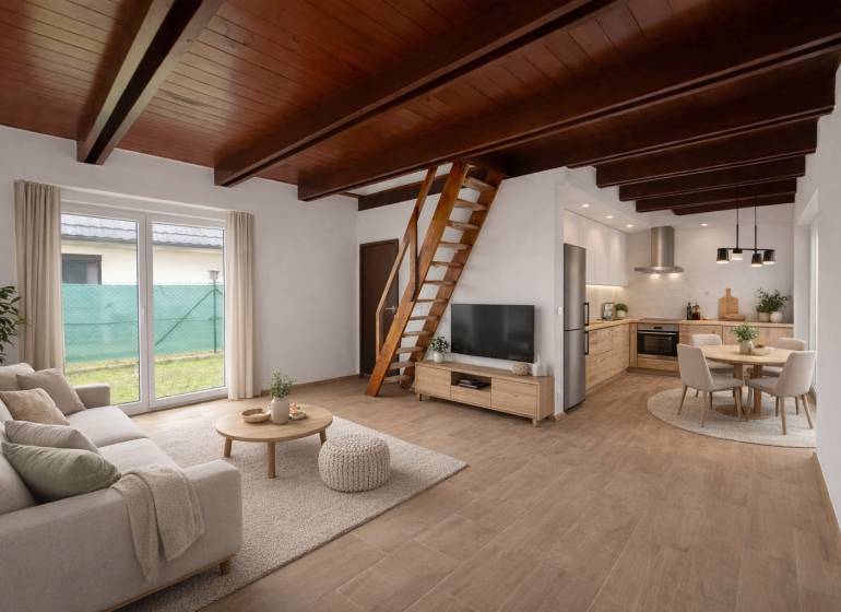 Wohnzimmer mit Küche in einem Einfamilienhaus, Treppen, Sofa, Fernseher, Esstisch, Boden mit Holzdekor.