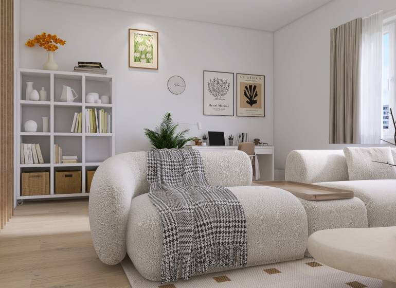 Helles Wohnzimmer in einer 3-Zimmer-Wohnung mit bequemen Möbeln und Bücherregalen voller Bücher.