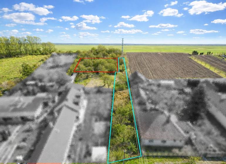 Grünflächen und Wohnbaugrundstücke in der Malá Paka Straße, Veľká Paka.