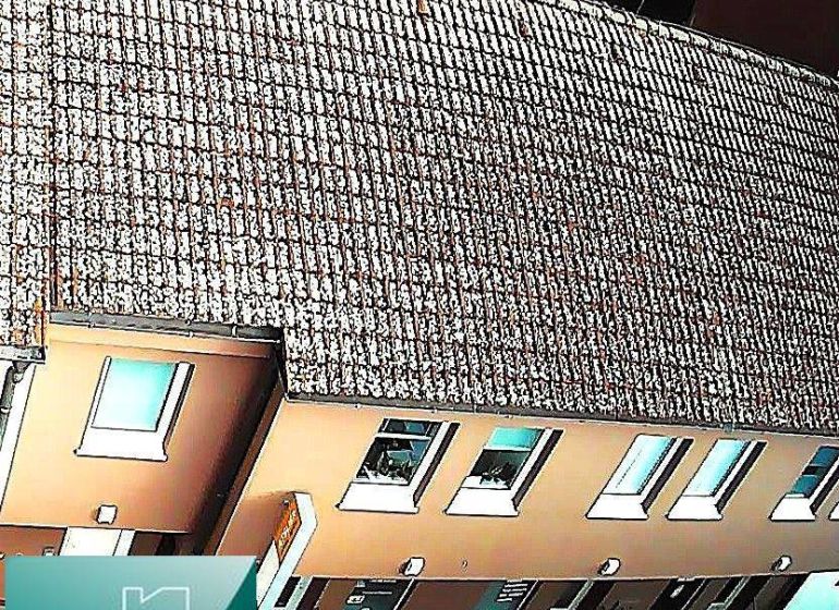 Einfamilienhaus in der Mäsiarska-Straße in Senec mit traditionellem Dach und Fenstern.