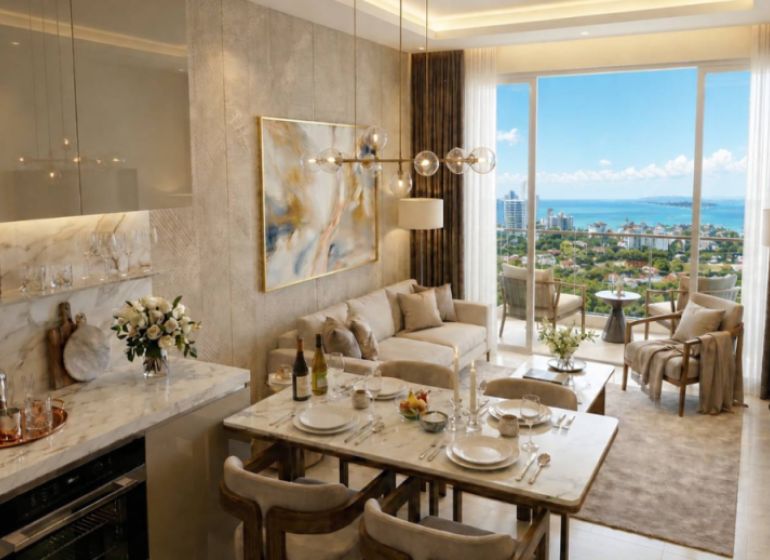 2-Zimmer-Wohnung mit Meerblick, elegantes Wohnzimmer und Essbereich.
