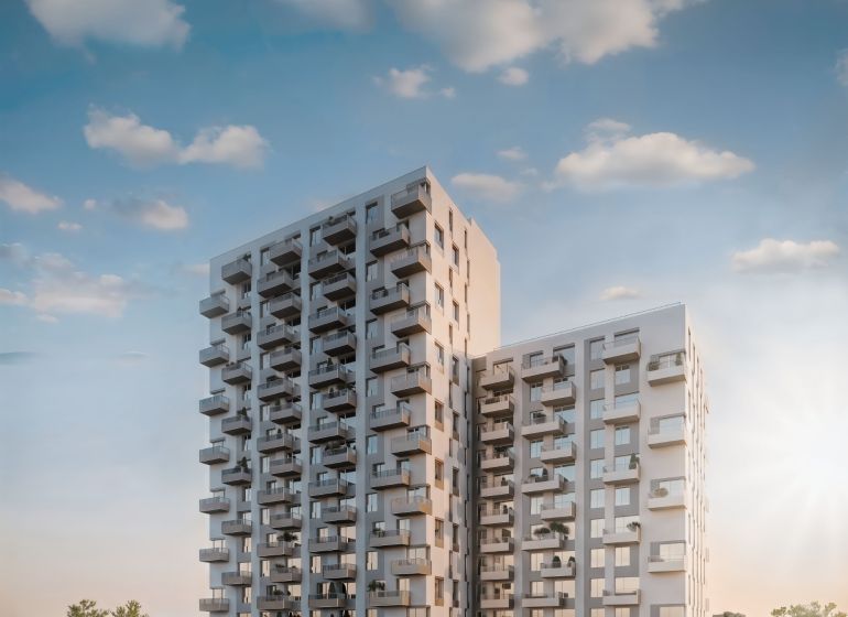 Ein Hochhaus an den Mlynské Nivy in Bratislava - Ružinov mit Balkonen und Grünflächen.