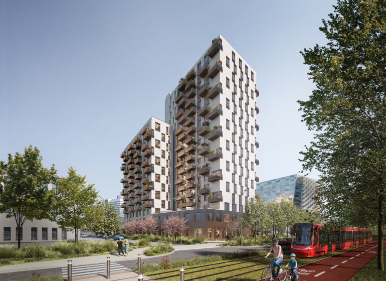 Neubau mit Balkonen, Radfahrer und Straßenbahn auf den Mlynské Nivy in Bratislava-Ružinov.