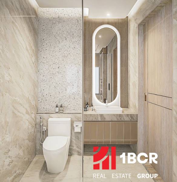 Badezimmer in einer 3-Zimmer-Wohnung mit moderner Sanitärausstattung und beleuchtetem Spiegel.