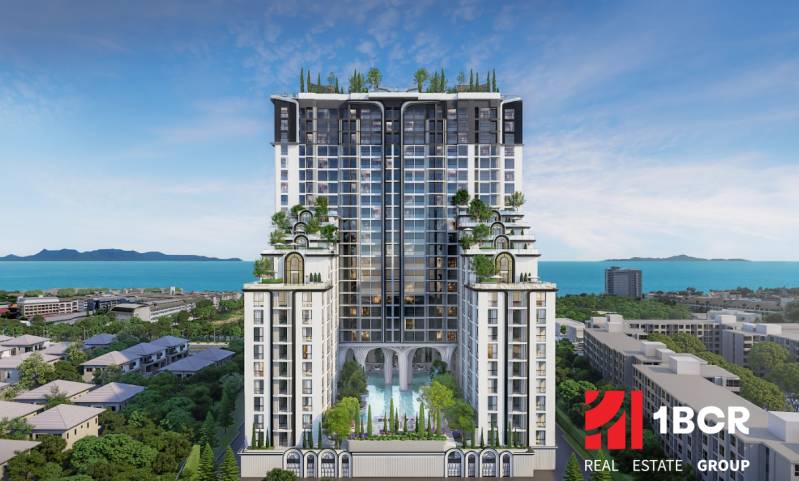 Wohnungsbau in der Stadt Pattaya mit Meerblick und grünen Terrassen.