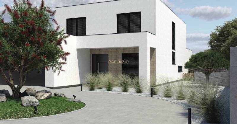 Ein Einfamilienhaus in Opoj mit einem minimalistischen Garten und einem gepflegten Eingang.