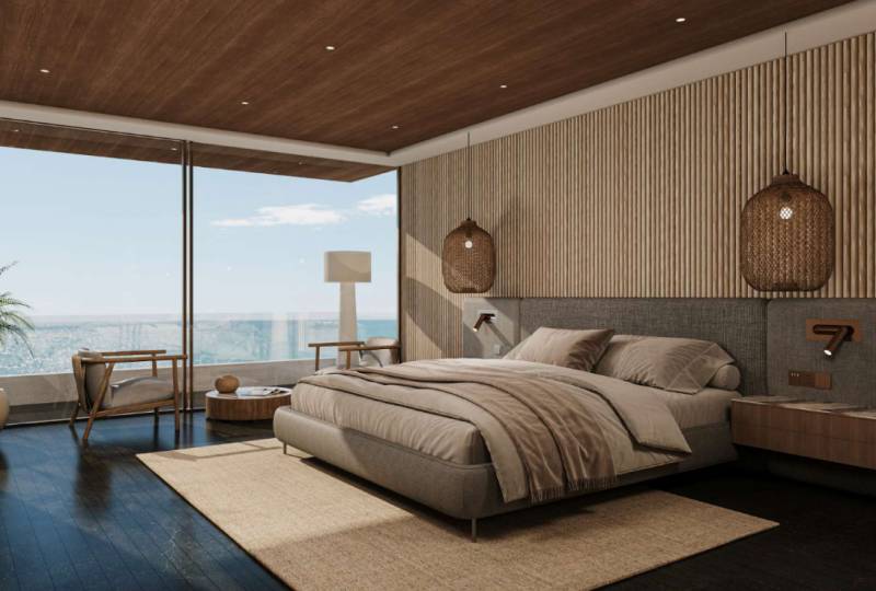 Ein Schlafzimmer in einem Einfamilienhaus mit großen Fenstern, einer Holzdecke und eleganten Möbeln.