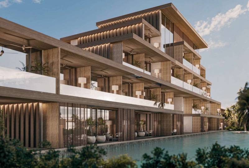 Ein Einfamilienhaus in Nungwi, Sansibar Nord mit Terrassen und einem Pool in der Nähe eines modernen Resorts.