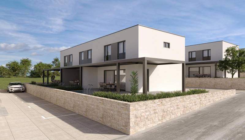 Exterieur einer 4-Zimmer-Wohnung in Mandre mit Terrasse, moderner Architektur und geparktes Auto.