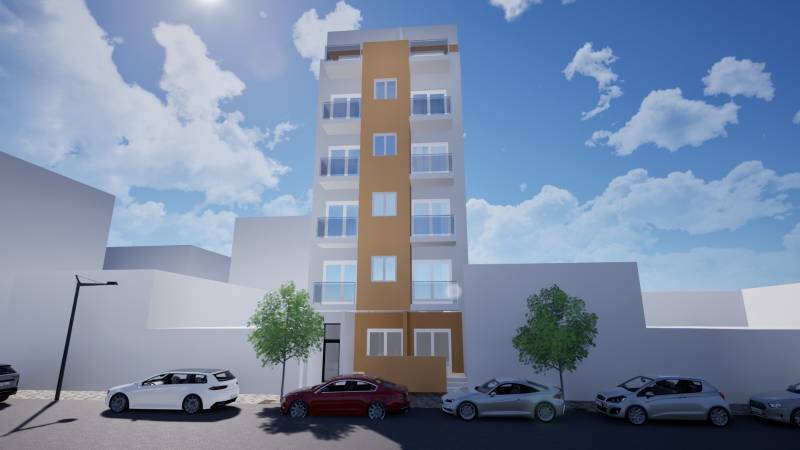 Ein sechsstöckiges Wohngebäude in der Campoamor-Straße 12 in Torrevieja mit geparkten Autos.