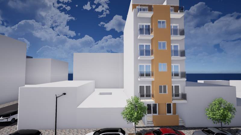 Ein Gebäude in Torrevieja in der Straße Campoamor 12, daneben sind Autos geparkt.