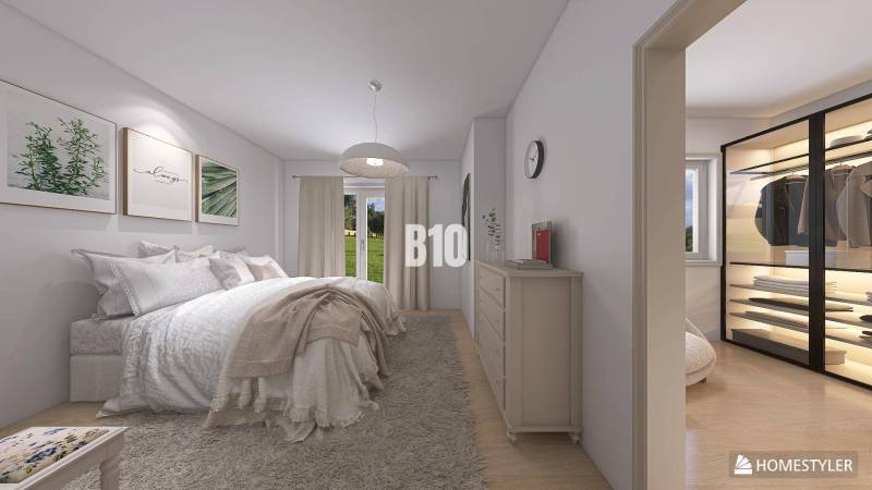 Helles Schlafzimmer mit großem Bett, Vorhängen und Schrank in einem Einfamilienhaus.