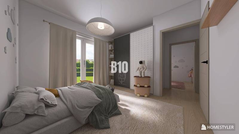 Kinderzimmer mit Bett, Dekorationen und Zugang zum Garten in einem Einfamilienhaus.