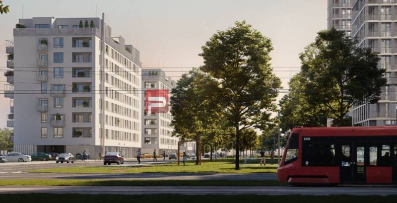 Gebäude in der Labutia-Straße, Bratislava V, mit Grünflächen und einer Straßenbahn im Vordergrund.