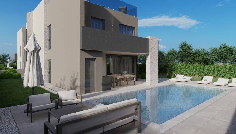 Villa in Poreč mit Pool, Garten und Sitzbereich auf der Terrasse.