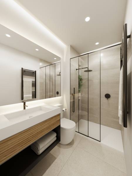 Ein stilvolles Badezimmer in einer 3-Zimmer-Wohnung mit einer Dusche und einem Waschbecken.